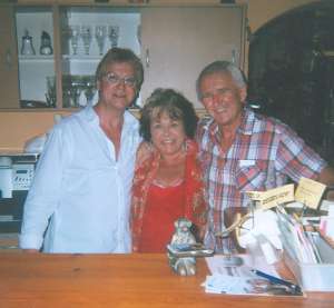 Deryn with the owners of the restaurant